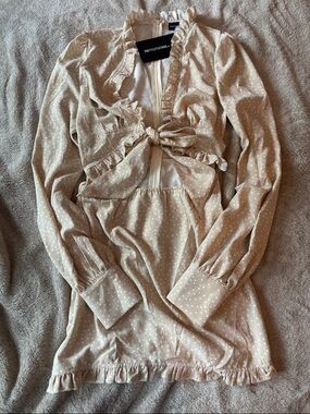 PrettyLittleThing Beige Polka Dot Ruffle Tie-Front Mini Dress